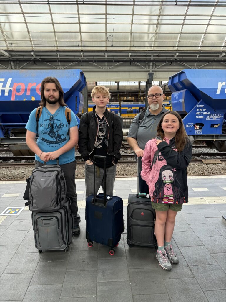 The kids getting ready to board the Eurorail train from Amsterdam to Paris