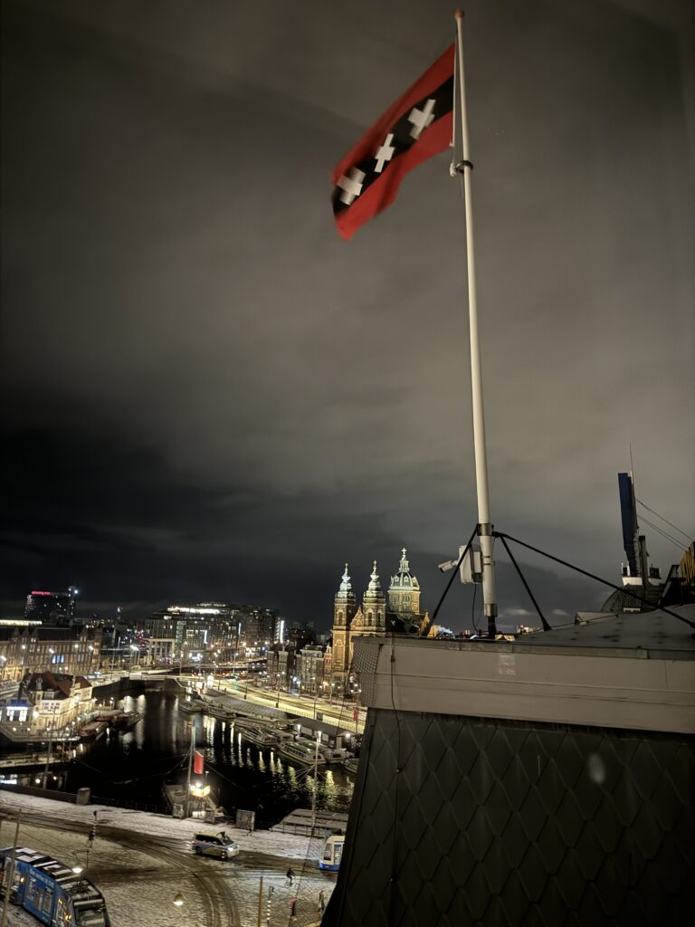 XXX on the Amsterdam Flag waving off a roof