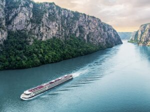 River cruise ship sailing down a European river